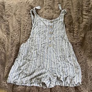 Super cute linen romper. Bathing suit cover or cute with a t-shirt. Never worn.